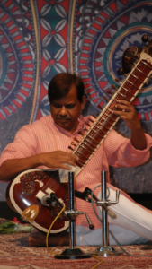 Pandit Nishindra Kinjalk performing sitar in a Event